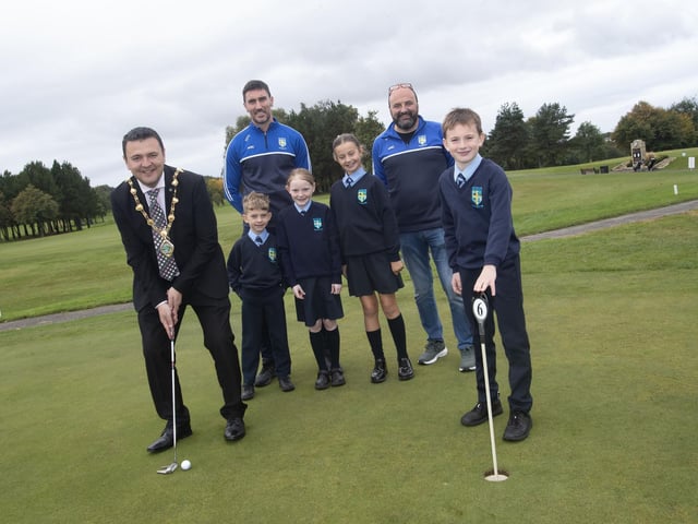 The Mayor of Derry City and Strabane District Council, Ruairi McHugh pictured at the recent Hollybush PS Golf Classic at Foyle Club. Included are pupils Rowan, Flynn, Eden and Ora. At back are Mr. O'Connor and Mr. Friel.