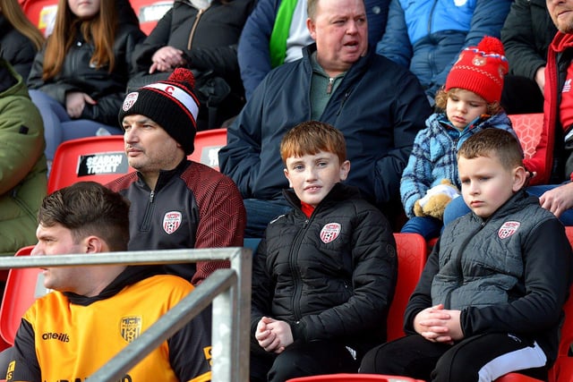 These Derry City fans are deep in thought at the game against Finn Harps. Photo: George Sweeney. DER2305GS – 14