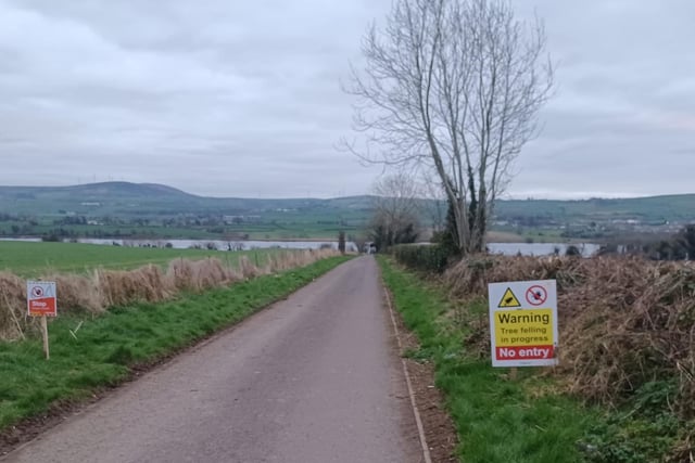 Notices warning the public to halt where the greenway begins at Ballougry Road.