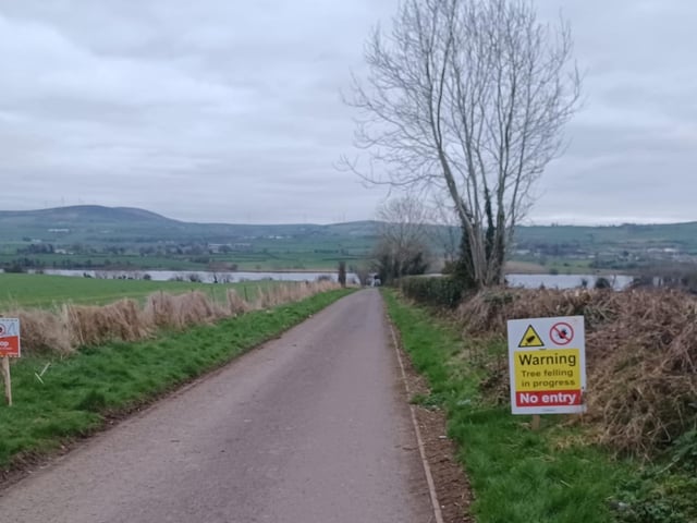 Notices warning the public to halt where the greenway begins at Ballougry Road.