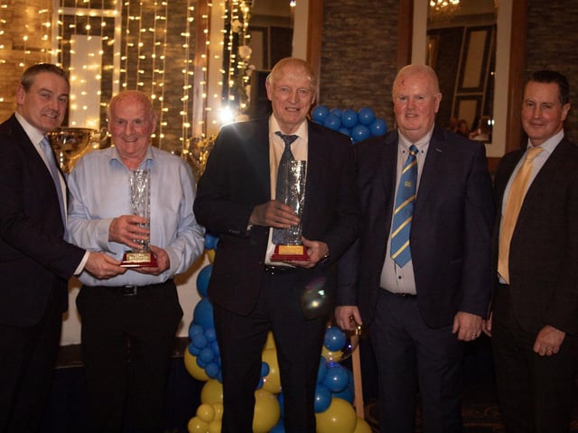 Hall of Fame recipients James McLaughlin and Danny Dowds receiving their induction trophies on Saturday night last. (Photo: Jim McCafferty)