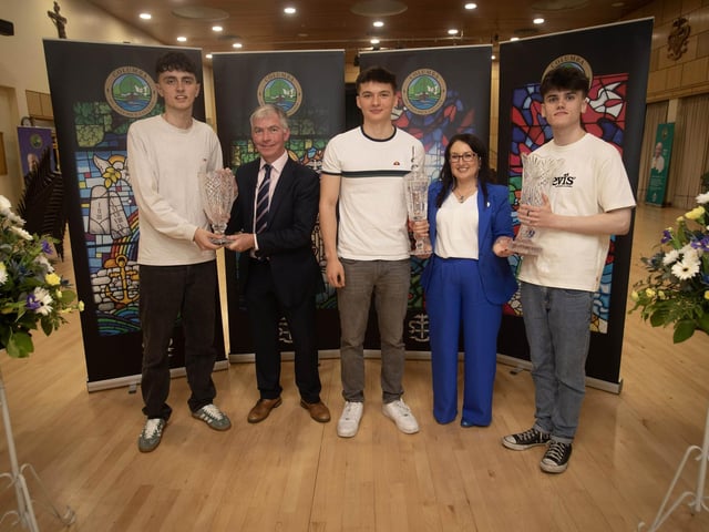 Daniel Gormley, The Cambridge Technical IT Prize, Thomas Lynch, The Professional Business Services Prize and Cillian O'Neill, The Health and Social Care Prize, receiving their awards from Mr. Niall Downey, guest speaker and Mrs. C. McLaughlin, Principal on Thursday night last.