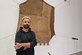 Stéphane Verlet-Bottéro with one of four tapestries created with the Inishowen-based artist Ruth McCartney as part of his current show 'The Wishing Forest' at the Void Art Centre.