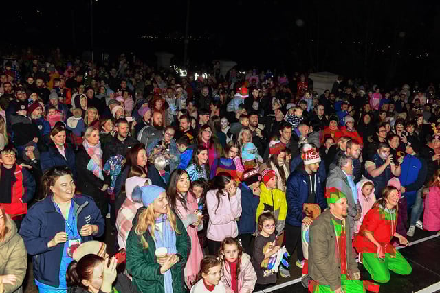 Families gather for the Elf Parade prior to the Christmas Lights switch on at the Community Hub on Friday night. Photo: George Sweeney