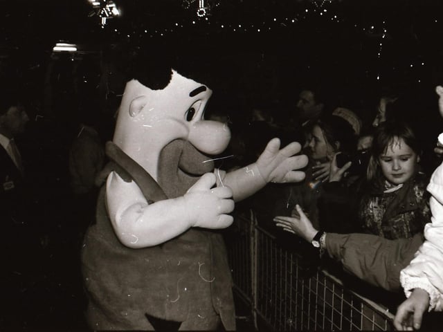 Santa, with help from TV Gladiator Falcon, also known as Bernadette Hunt, switched on the Derry Christmas lights.