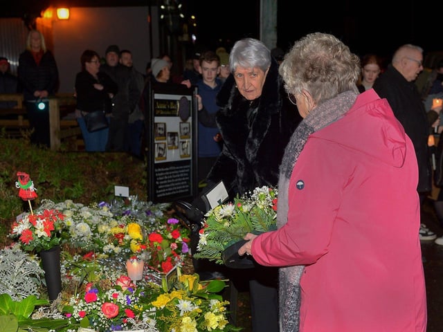 Relatives take part in a wreath laying event, at Strabane Old Road on Tuesday evening, marking the 50th Anniversary of the Annie’s Bar massacre. Photo: George Sweeney. DER2251GS – 16