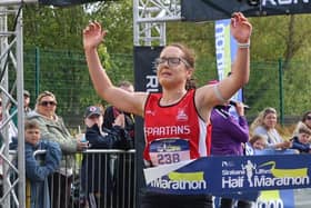 City of Derry Spartans Sarah Kelly crossed the finish line to claim the women's title at the Strabane - Lifford Half Marathon.