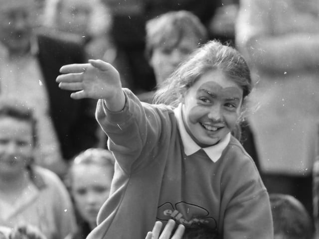 A great vantage point for this reveller at the St. Patrick's Day festivities in Derry in 1998.