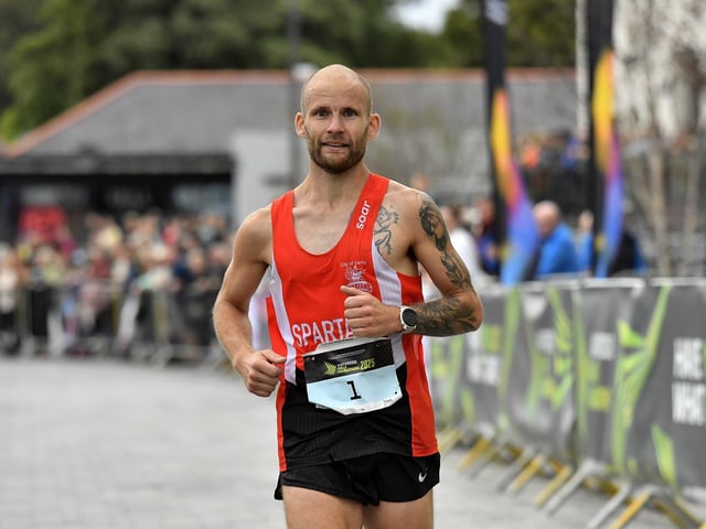 Kyle Doherty, City of Derry Spartans, finishes in fourth place in the 2025 Waterside Half Marathon. Photo: George Sweeney