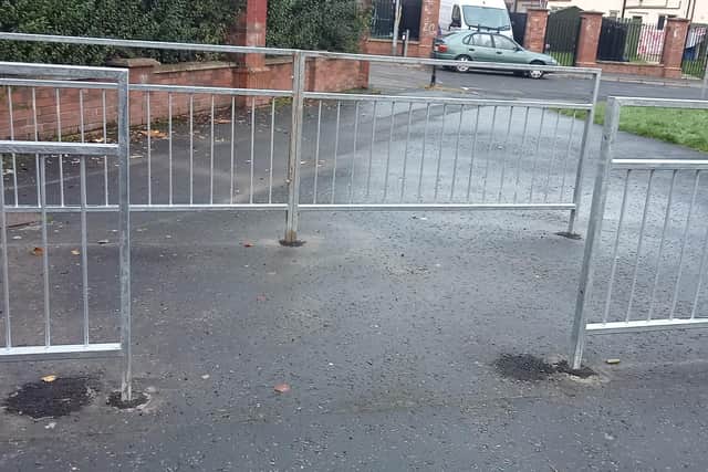 The railings are located adjacent to Durrow Park and Dove Gardens