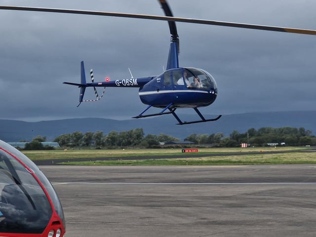 VIP tour and helicopter ride over Amelia’s flight path.