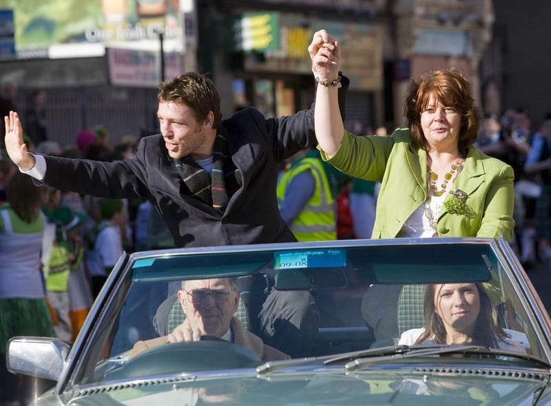 Derry's professional boxer John Duddy  with Deputy Mayor Patricia Logue salutes the thousands of people who lined the route of the St. Patrick's Day Parade