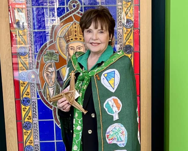 Dana in St. Brigid's cloak in the St. Patrick's Centre.