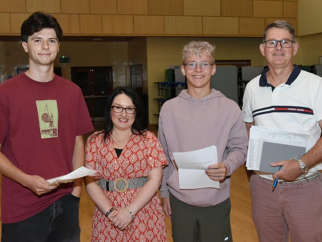 St Columb's College A Level students, Rory Boyle and Aaron McCrudden, pictured with Vice- Principals Caroline McLaughlin and Brian Keys on A Level Results Day 2023.