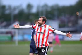 Derry City's flying Scotsman Paul McMullan celebrates putting the Candy Stripes in front against Shelbourne at Brandywell. Photograph by Kevin Moore.