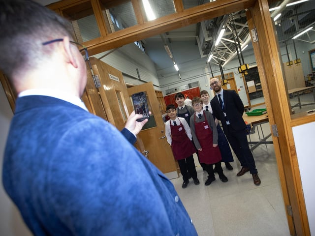 Vice Principal Mr Keys showing off his camera skills during Saturday's Open Day. : .