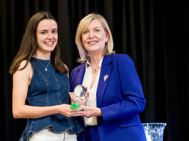 Professor Cathy Harrison presents the Lily Sweeney Award for Contribution to School Community to Hannah Wade
