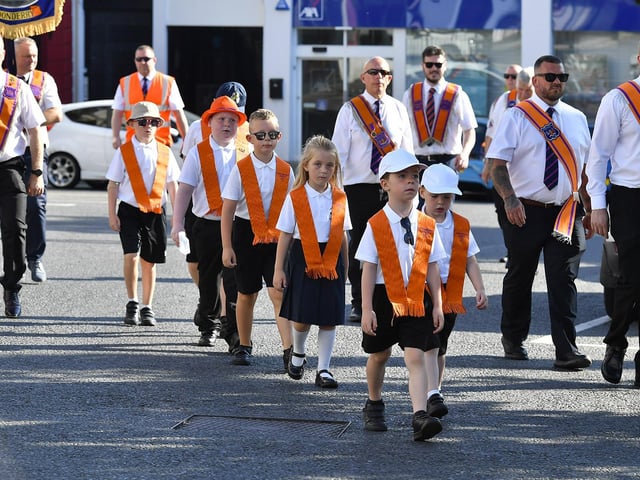 Children participate in the July 12 celebrations in Derry’s city centre on Saturday morning. Photo: George Sweeney