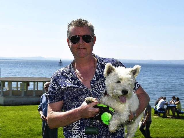 Angelo with Jonathan McLaughlin at the Moville Summer Festival Pet Show, held on The Green. Photo: George Sweeney