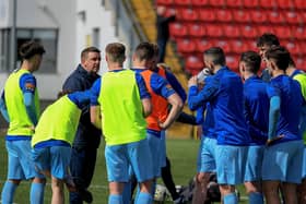 Institute coach Mo Mahon speaking to players as 'Stute plan for one final push at Portadown.