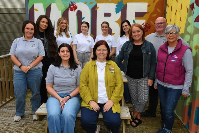 Members of The Hive Cancer Support Group and Triax Neighbourhood Management Team pictured at the launch of the newly revamped More and Less shop in the Pilot’s Row car park, Rossville Street. Photo: George Sweeney