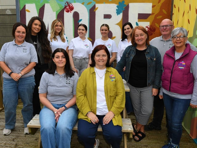 Members of The Hive Cancer Support Group and Triax Neighbourhood Management Team pictured at the launch of the newly revamped More and Less shop in the Pilot’s Row car park, Rossville Street. Photo: George Sweeney