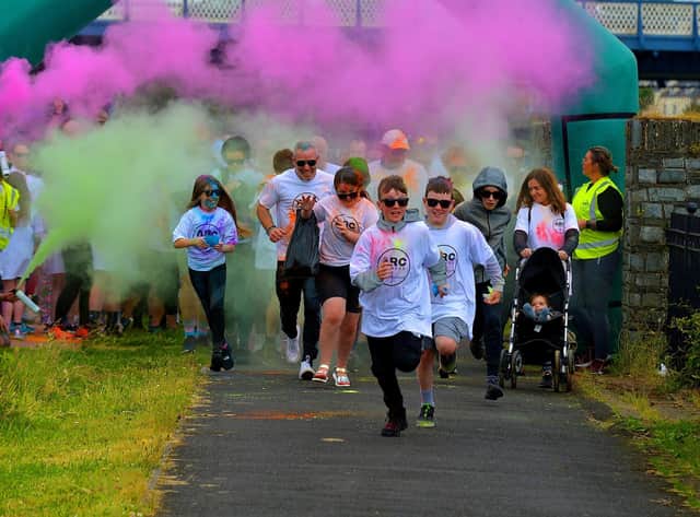 The ARC Fitness Father’s Day 2K Colour Dash gets underway last year at Destined, Foyle Road. Photograph: George Sweeney.  DER2226GS – 007