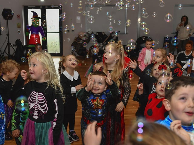 Pictured are young children and relatives at the he Waterside Shared Village cross-community Halloween kids costume party and disco with entertainment from Jo Jingles and Gary McMusic.