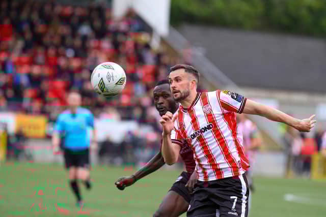 Derry City winger Michael Duffy races past Galway right back Jeanno Esua at Brandywell. Photograph by Kevin Moore.