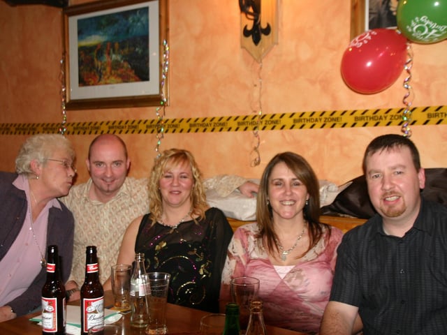 Birthday Boy Raymond with friends Left to right Claire Meehan, Eddie and Una McFarland, and Naula Mc Monagle . 1191/dd : Parties in December 2005.