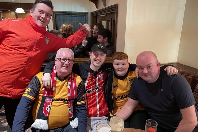 It's thirsty work following Derry City and these fans take a well earned break in a local pub before kick-off.