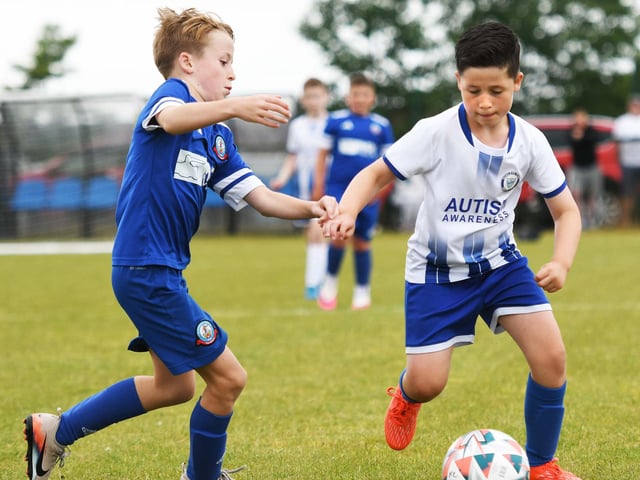 Action from the under-9's match between Buncrana Hearts and Quigley's Point Swifts during the O'Neills Foyle Cup at the Shared Village Centre.