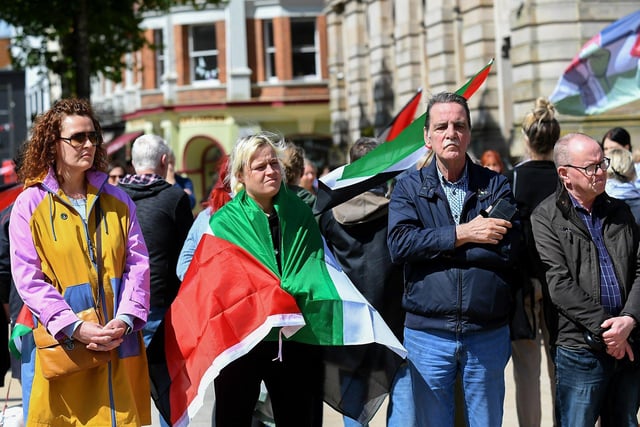 People gather at a rally in Guildhall Square, organised by the Derry Branch of Ireland Palestine Solidarity Campaign to mark 300 days of Genocide in Gaza. Photo: George Sweeney