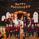 Children at Saint Eithne’s Primary School in Derry were having a thrilling time this week as they took part in a Hallowe'en Bowl-a-Thon school fundraiser.  Pictured are P5 bowlers wishing everyone a Happy Hallowe'en. Photo: Conor McClean/ Derry Journal.