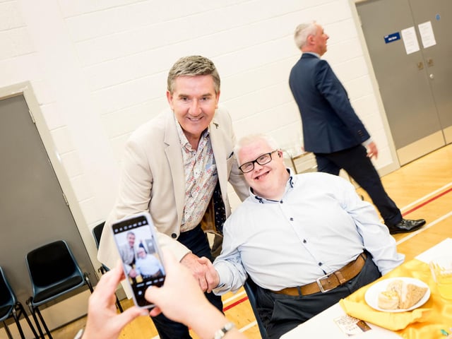 Daniel O'Donnell with a guest at the Afternoon Tea with Daniel O'Donnell on Sunday in St Mary's College, Derry, in conjunction with St Eugene's Cathedral. Picture: Stephen Latimer.