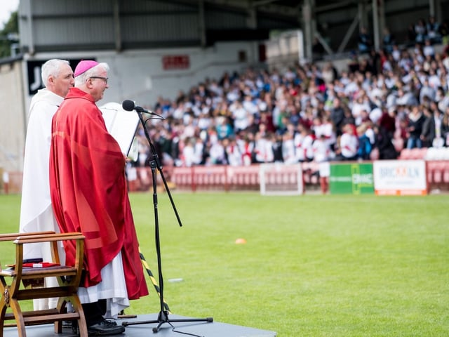 Participants at the Derry Diocese Fan The Flame annual Mass 2025 in Celtic Park.