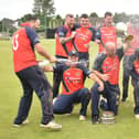 The champagne is flowing as Brigade celebrate their Sports Hub Senior Cup success against Newbuildings. (Photo: Lawrence Moore)