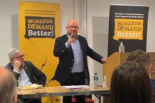 Owen Reidy, ICTU General Secretary, (speaking) and Gerry Murphy, from INTO, at a recent Town Hall meeting in support of ICTU's Workers Demand Better campaign.