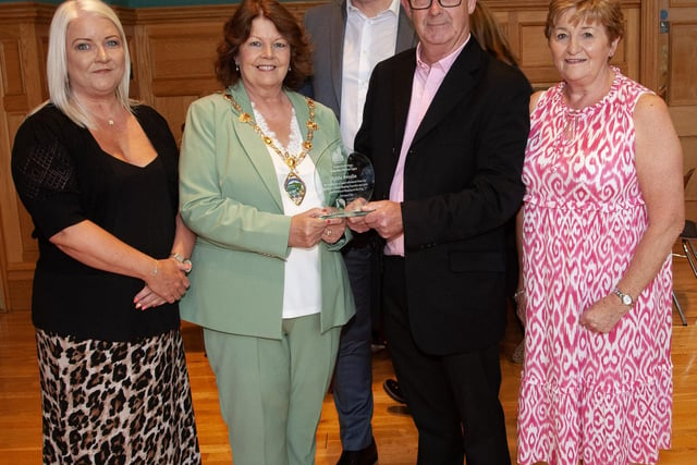 The Mayor Patricia Logue pictured with Eddie Breslin and some of his former colleagues from the Housing Executive at a function in his honour at the Guildhall on Thursday evening.