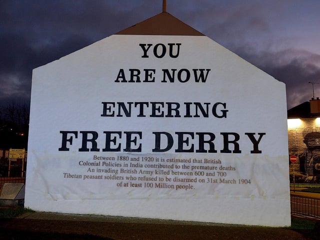 One of the projected images, on Free Derry Corner on Thursday evening, of the British colonial past from the ‘The Sun Never Set And The Blood Never Dries’ art project created by Art Everywhere. The event was part of Bloody Sunday 51 anniversary. Photo: George Sweeney. DER2305GS – 106