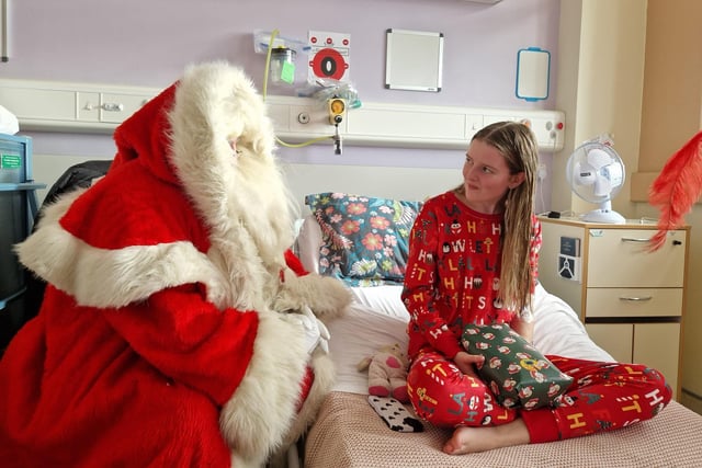 Santa chatting with Olivia King (15) from Coleraine.