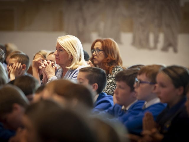 St. Brigid’s Primary School Principal Mrs. Mary McCallion pictured among her pupils at last week’s Mass of Thanksgiving for those who made their Confirmation.