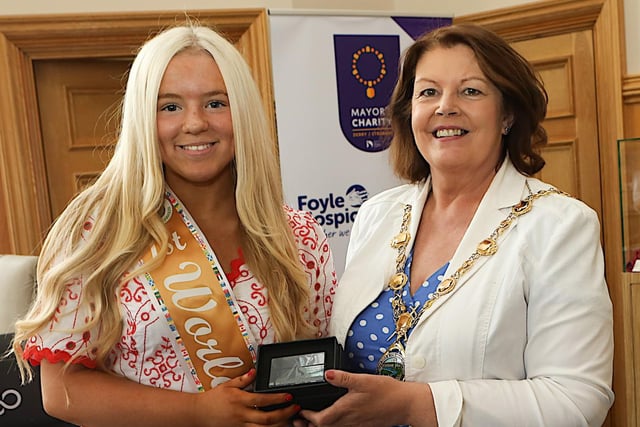 Mayor Patricia Logue presents a gift to Ava McDevitt, World Champion Irish Dancer. (Photo - Tom Heaney, nwpresspics)