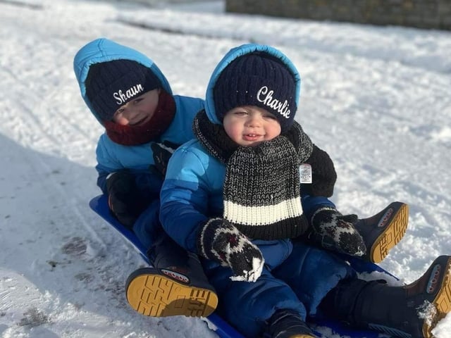 Shaun and Charlie having lots of fun in the snow.