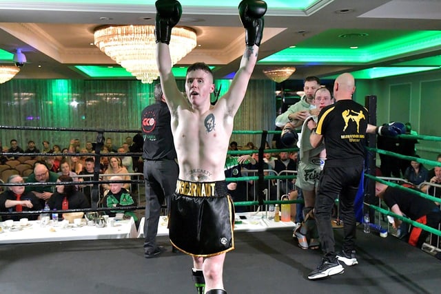 Rathmor Warrior’s Conal McBrearty celebrates his defeat of CJ Silcock, Fightclub NI, to win the All Ireland 66kg K1 Title, on Saturday evening last, in the Everglades Hotel. Photo: George Sweeney. DER2312GS – 79