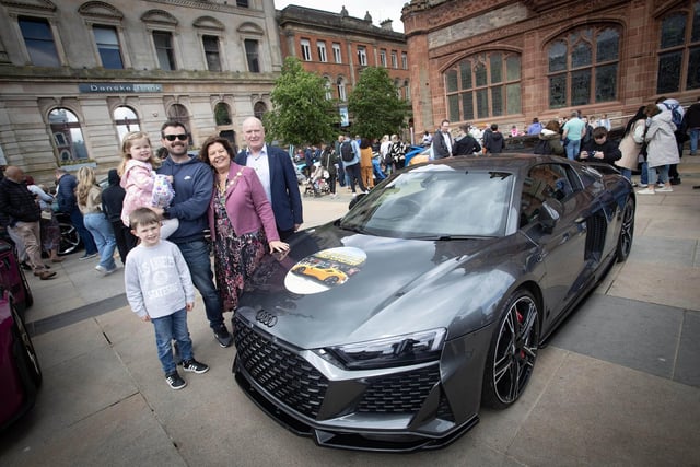 SIUPERCAR SATURDAY. . . .The Mayor Patricia Logue, husband James, son Ronan and grandchildren Dara (6) and Aoibhe (3) at Saturday's Supercar Saturday event to raise funds for her charitites.