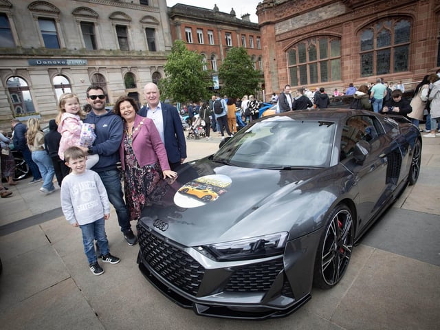 SIUPERCAR SATURDAY. . . .The Mayor Patricia Logue, husband James, son Ronan and grandchildren Dara (6) and Aoibhe (3) at Saturday's Supercar Saturday event to raise funds for her charitites.