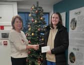 Deirdre Bradley, chairperson of the Carndonagh Traders’ Association (left) with Win Your Dream Christmas winner Laura Duncan.