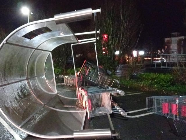 An overturned trolley canopy in Sainsbury’s supermarket.