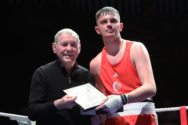 Derry Boxing legend Charlie Nash makes a presentation to winner, Tiarnan Mayse, who defeated Peter Clarke in the 75kg special event bout. (Photo - Tom Heaney, nwpresspics)